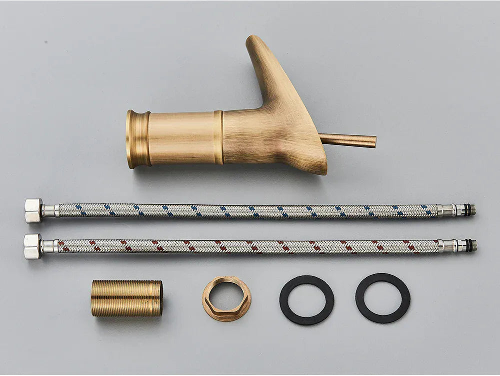 Mitigeur de lavabo cascade haut en or brossé