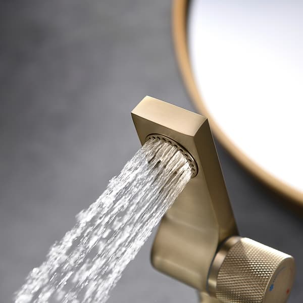 Mitigeur design pour lave main or brossé