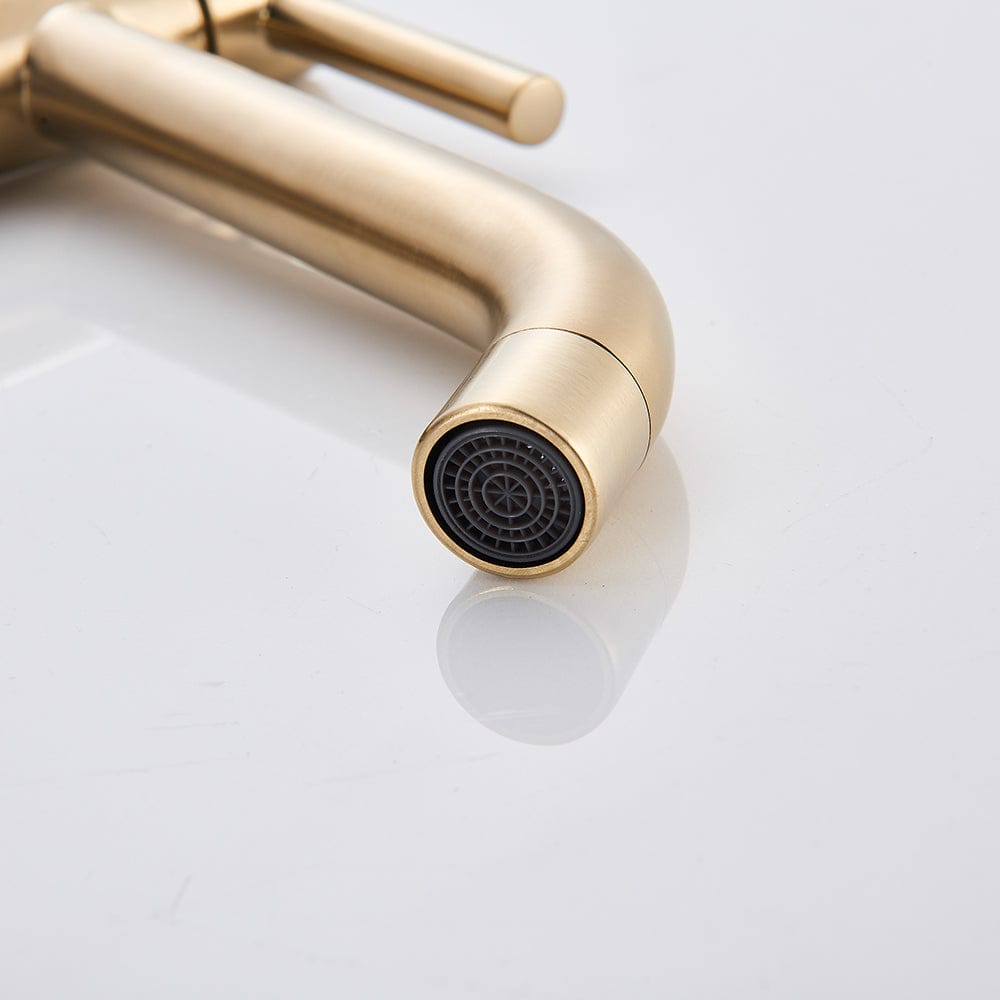 Mitigeur haut de lavabo en or brossé